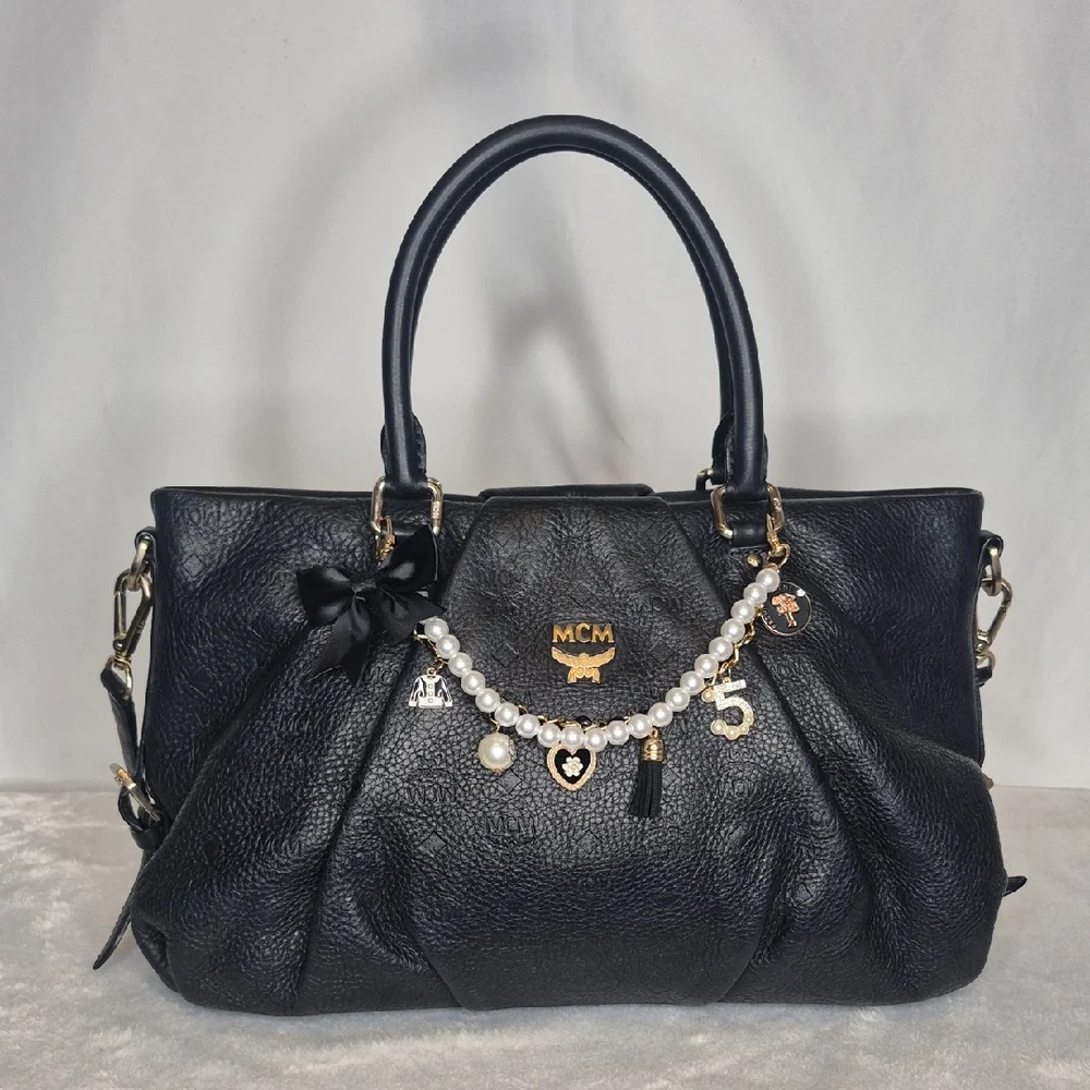 MCM Black Leather Handbag with Gold Accents